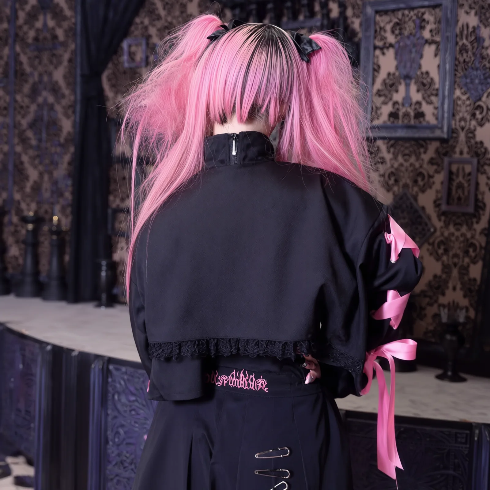 The same set from behind, showing the ribbon lacing down the back.